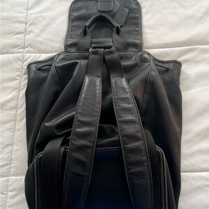 Vintage Coach Black Leather Drawstring Backpack Flap Buckle Gold Hardware 90s C6